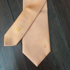 Louis Vuitton tie.